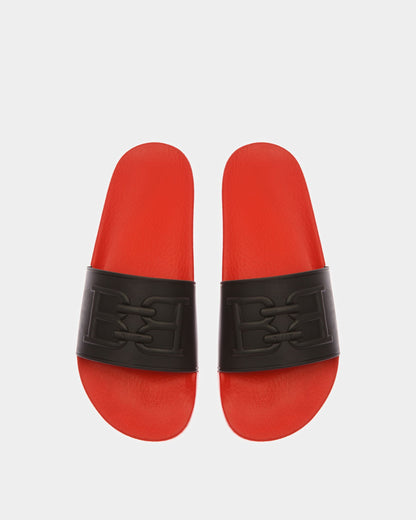 Scotty Rubber Sandals In Black And Orange