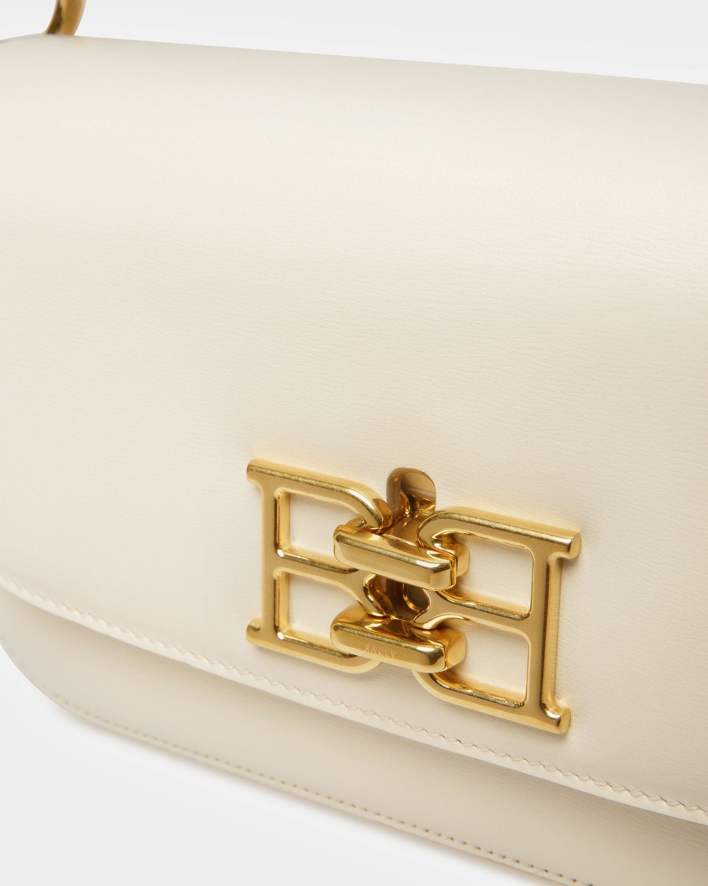 Brodye Leather Crossbody Bag In Bone
