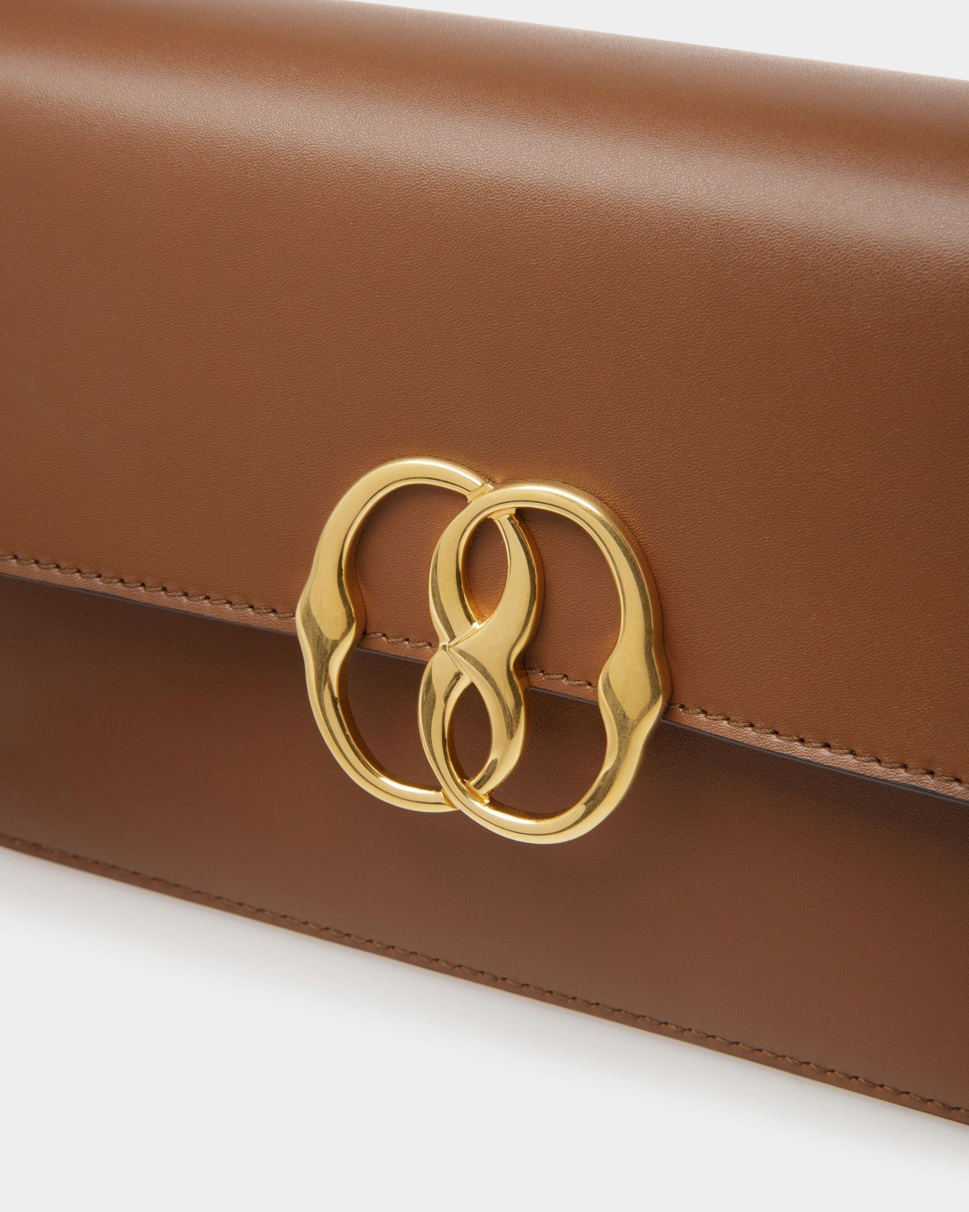 Emblem Folio | Women's Shoulder Bag | Brown Leather | Bally | Still Life Detail
